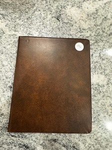 BOOK OF MIXED FOREIGN COINS