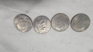 lot 300 image: Ike Silver Dollars