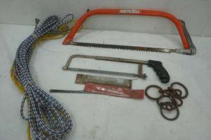lot 2 image: Ropes and hand saw lot, saw blades