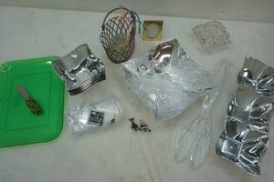 lot 49 image: Plastic and other serving pieces plus crystal candle holder