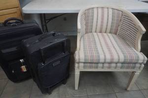 lot 73 image: Kincade comfy padded wicker chair and 2 suitcases