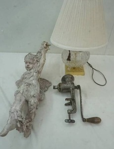 lot 74 image: hanging angel sculpture, vintage meat grinder, and glass lamp