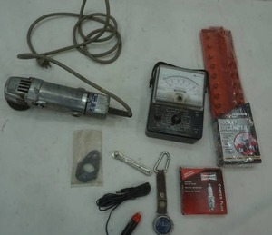 lot 93 image: socket organizer, spark plugs, Makita disk grinder, voltage meter and more