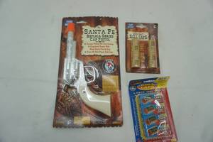 lot 158 image: Cap gun and caps. NEW IN PACKAGE