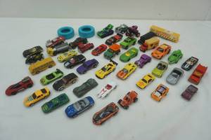 lot 215 image: toy car lot some vintage, some diecast, midge toy, hot wheels, matchbox.