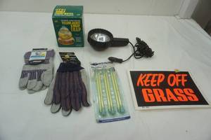 lot 229 image: small hardwares lot work gloves, tent stakes, spotlight, keep off the grass sign, wasp trap