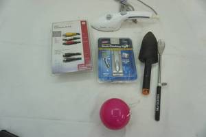 lot 255 image: shoe horn, portable bird feeder, steamer iron, book light, audiovideo cords