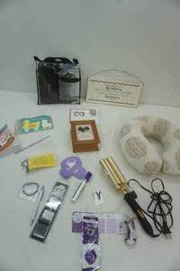lot 264 image: person care lot support belt new in packaging, travel neck pillow, music box and more