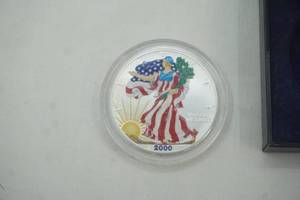 lot 316 image: 2000 Colorized American Silver Eagle 1oz fine silver. One dollar coin.