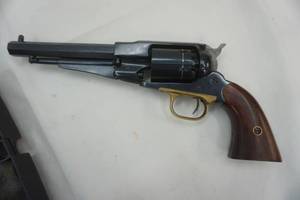 lot 318 image: black powder pistol. made in Italy. 36 Caliber. comes with shots, precision caps, patches, balls, loading equipment, and gun case.