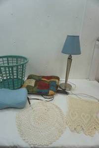 lot 320 image: small housewares lot lamp, seat cushion, basket, neck cushion, doilies