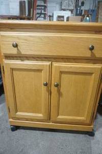 lot 334 image: TV Stand on wheels with drawer 30x 34