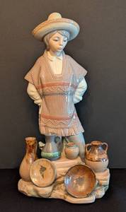 lot 16 image: Vintage 1980s Lladro Mexican Boy Selling Pots Porcelain Figurine