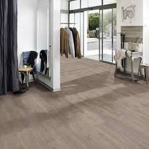lot 13 image: 11 Cases of TrafficMaster Taupe Oak 4 MIL x 6 in. W x 36 in. L Peel and Stick Water Resistant Luxury Vinyl Plank Flooring (36 sqftcase)