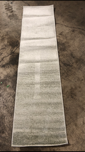 lot 41 image: Haze Solid Low-Pile Green 2 ft. x 8 ft. Runner Rug Customer return Review all pictures
