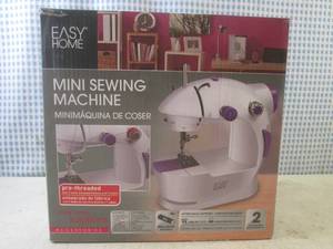 lot 119 image: (BS) Easy Home Mini Sewing Machine...