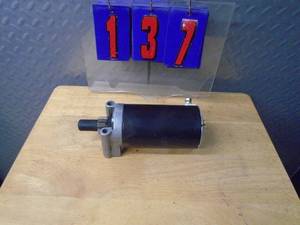Used small engine starter Briggs Works. #320980311A36. As shown.