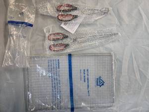 lot 33 image: Lot of 3 sets of Mesh Grill Wire Mats and 2 tongs large 13 x 15 & Small 9.25 L x 2.95