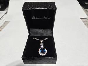 lot 93 image: Gold Coast Platinum Plated Blue & Clear Fashion Rhinestone Pendant Necklace  Brand New Sold online from $80 to $250