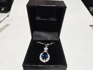 lot 96 image: Gold Coast Platinum Plated Blue & Clear Fashion Rhinestone Pendant Necklace  Brand New Sold online from $80 to $250