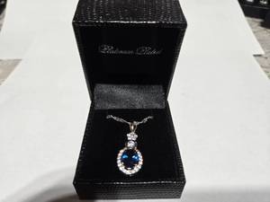 lot 97 image: Gold Coast Platinum Plated Blue & Clear Fashion Rhinestone Pendant Necklace  Brand New Sold online from $80 to $250
