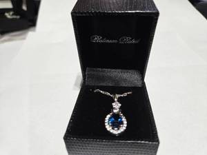 lot 125 image: Gold Coast Platinum Plated Blue & Clear Fashion Rhinestone Pendant Necklace  Brand New Sold online from $80 to $250
