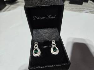 lot 134 image: Gold Coast Lab Emerald Diamond Platinum Plated Sterling Silver Earrings with Green Jewel  Brand New Sold online from $80 to 250