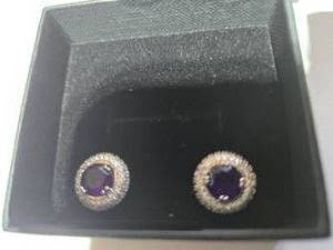 lot 152 image: Gold Coast Platinum Plated Earrings  Purple Centerpiece with Sparkling Silver Accents  Brand New Sold online for $60
