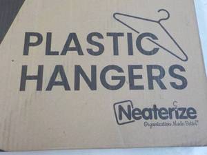 20 Plastic Hangers...
