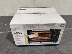 lot 125 image: Mainstays 4 Slice Toaster Oven with 3 Settings, includes Baking Rack and Pan