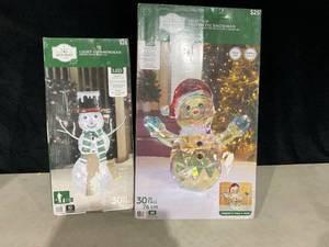 lot 404 image: LOT OF 2 Holiday Time Light-up Snowman