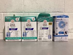 lot 576 image: LOT OF 4 GuruNanda Advanced Dental Water Flosser 3.0 with UV Light