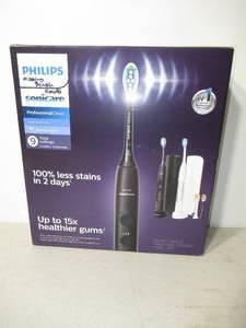 lot 7 image: Philips Sonicare Professional Clean Rechargeable Electric Toothbrush, 2-pack-Missing Brush Heads