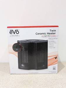 lot 1 image: NEW EVO TWIN CERAMIC HEATER