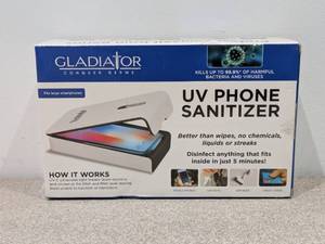 lot 36 image: NEW GLADIATOR UV PHONE SANITIZER