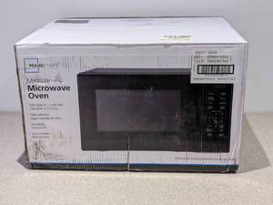 lot 48 image: MAINSTAYS MIDSIZE MICROWAVE OVEN