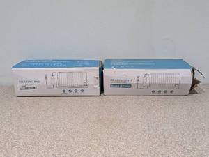 lot 79 image: 2 NEW HEATING PADS
