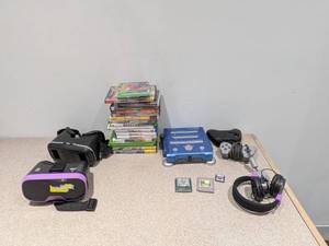 lot 27 image: ASSORTED GAMES & GAMING CONSOLE