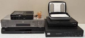 lot 24 image: (1) Marantz Portable Cassette Recorder (1) Magnavox DVD 609 DVDCD Player (1) Insignia DVD (1) i - Fusion (1) Blue HD Digital Video Recorder (1) CRC Digital Video Recorder