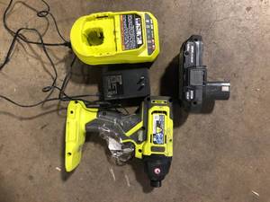lot 7 image: RYOBI ONE 18V Cordless 14 in. Impact Driver with Battery and Charger Customer Returns See Pictures
