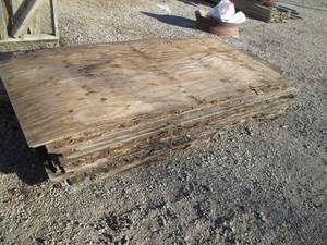 lot 5 image: Pile of mixed OSB and plywood, used...