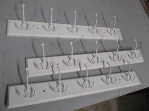lot 22 image: 3 New 26 wide coat hooks...