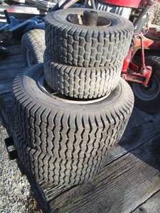 lot 62 image: Set of lawnmower tires...