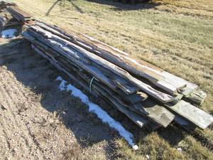 lot 76 image: Pallet of rough cut boards...