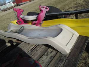 lot 84 image: 2 Plastic slides and a swing  for a...