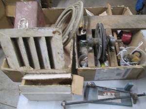 lot 128 image: Planing guage, hardware, new mower ...