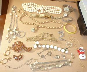 lot 2 image: Another vintage lot of necklaces, bracelets, watches, pins and ear rings