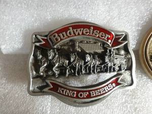 lot 14 image: THREE belt buckles - Budweiser - Jack Daniels - Wolf