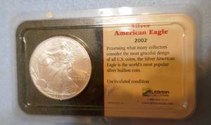 lot 20 image: 2002 Silver American Eagle uncirculated