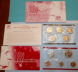 lot 22 image: Two 1999 Uncirculated Coin sets introducing the state quarters